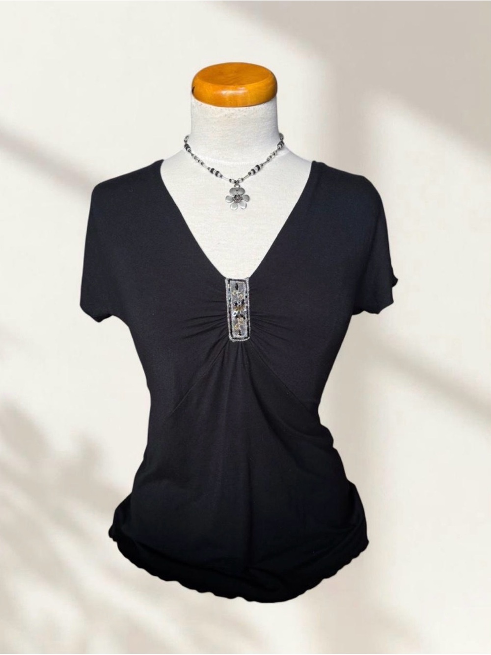 Studio Black V-Neck Short Sleeve Top with Center Jeweled Tab